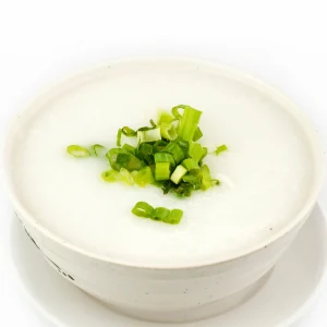 Congee rice porridge at Noodle Wok Mississauga — silky smooth with scallions