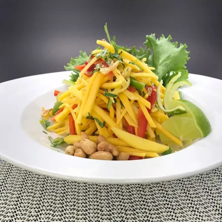 Soup and salad at Noodle Wok Mississauga — Thai mango salad and wonton soup